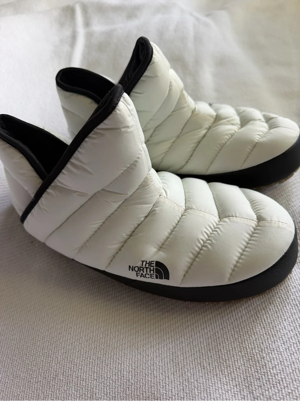 The North Face White and Black Quilted Slip-On Winter Booties